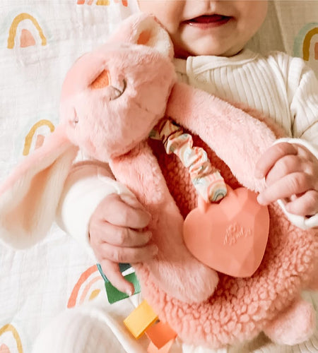 - Itzy Lovey Including Teether, Textured Ribbons & Dangle Arms; Features Crinkle Sound, Sherpa Fabric and Minky Plush; Bunny